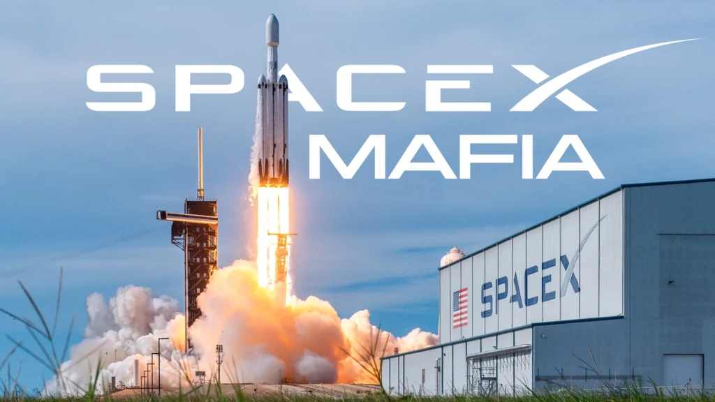 SpaceX Rocket Launch – Tumisang Bogwasi SpaceX rocket lifting off from launch pad with bright flames and thick smoke near a facility building.