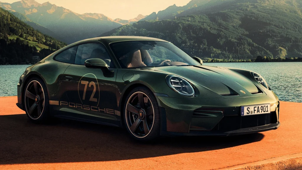 Porsche 911 Sport Classic by the Lakeside Mountains – Tumisang Bogwasi Dark green Porsche 911 Sport Classic parked beside a lake with mountains in the background during golden-hour light.