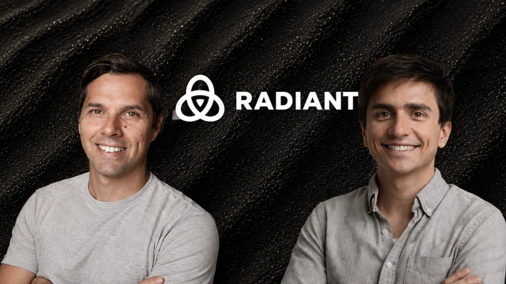 Two men smiling with folded arms in front of a dark, speckled backdrop featuring the Radiant logo and wordmark above them.